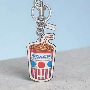 Coach milkshake leather bag, charm keychain
NWT with dust bag